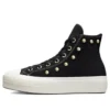 Baskets montantes Chuck Taylor All Star à semelle compensée en daim cloutées « Noir »