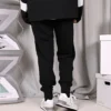 Pantalon Icon Play, tailles asiatiques, « Noir »