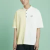 Polo à manches courtes Converse pour homme, col à revers, coloris contrastés, crème et jaune