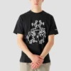 T-shirt à manches courtes et col rond Converse x Keith Haring Crossover Cartoon Pattern pour homme, noir