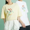 T-shirt à manches courtes et col rond, imprimé sportif, jaune clair